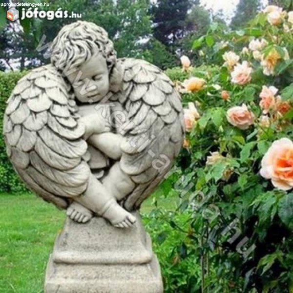 Bibliát szorongató angyal kő szobor
