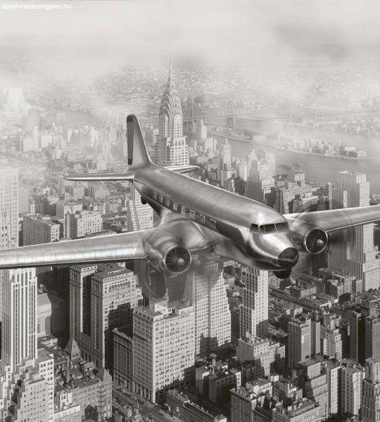 Repülőgép a város felett, poszter tapéta 225*250 cm