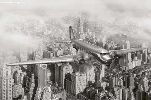 Repülőgép a város felett, poszter tapéta 375*250 cm