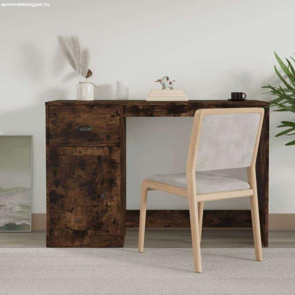vidaXL füstös tölgy színű szerelt fa íróasztal fiókkal 115x50x75 cm
