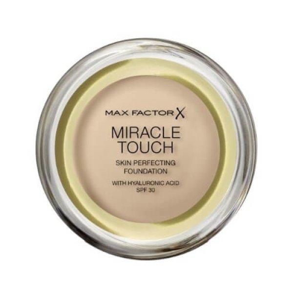 Max Factor Habos alapozó Miracle Touch (Skin Perfecting Foundation) 11,5 g
45