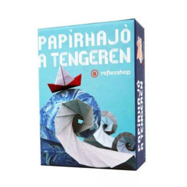 Papírhajó a tengeren