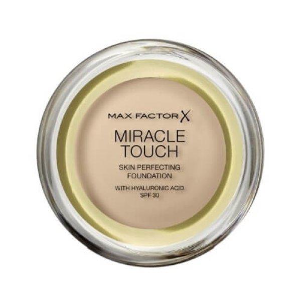 Max Factor Habos alapozó Miracle Touch (Skin Perfecting Foundation) 11,5 g 60
Sand