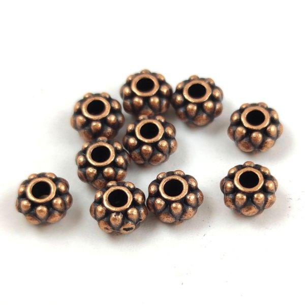 Fémgyöngy - Dots Deco - antik vörösréz színű - 6.5 x 4.5 mm 
