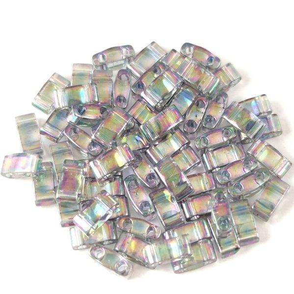 Miyuki féltila gyöngy - 2440d - szivárvány lüszteres transzparens sötét
szükre - 2.3x5mm